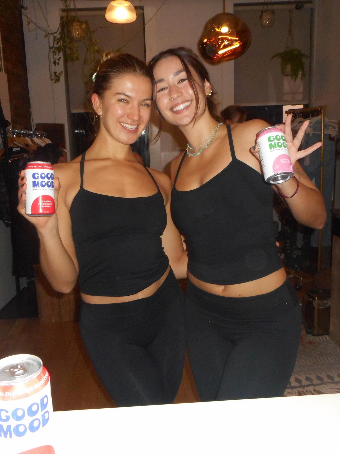 Members with kombucha in the lounge